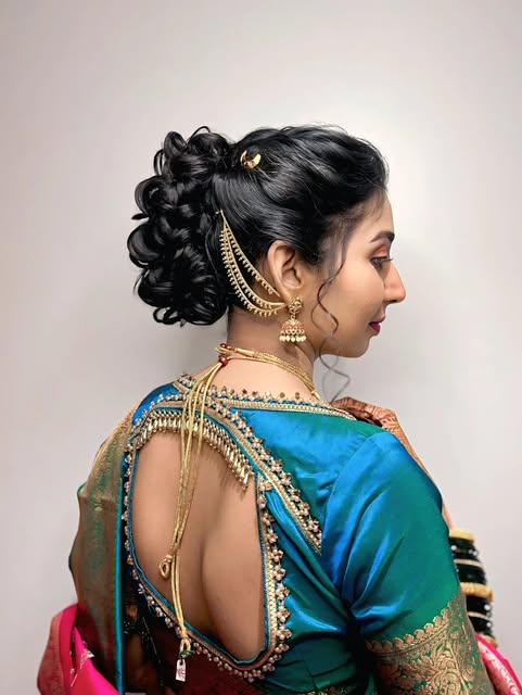 Side and back view of a sculpted braided bun, gold hair ornament and teal sari, from Pooja Salunkhe Makeover's portfolio