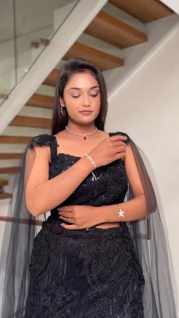 Fashion makeup portrait with a black embellished outfit and long softly styled hair, from Pooja Salunkhe Makeover's portfolio